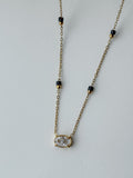 The round Crystal Demifine Mangalsutra i