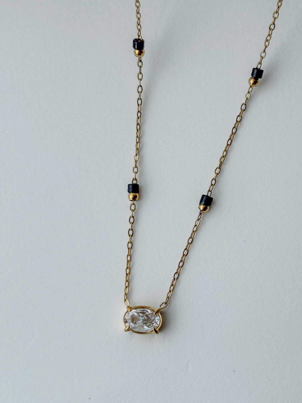 The round Crystal Demifine Mangalsutra i