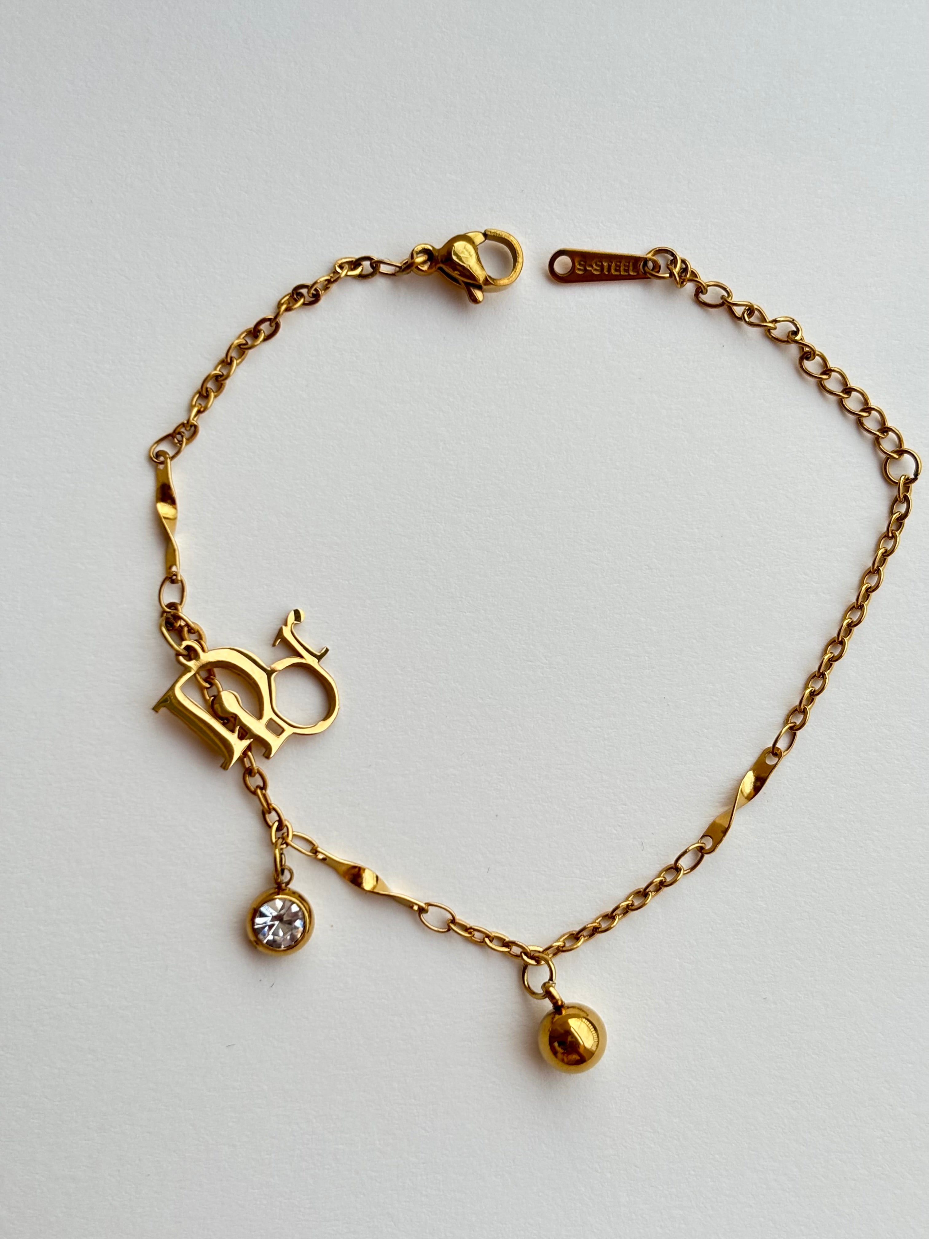 Golden Little Things On The Bracelet